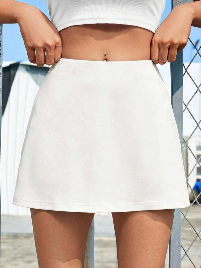 white knit mini skort with phone pocket