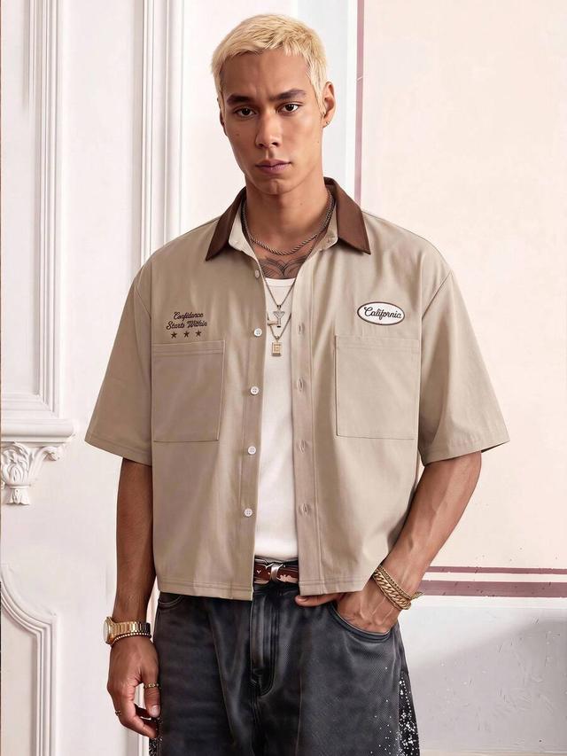 beige short sleeve shirt with contrast collar and embroidery