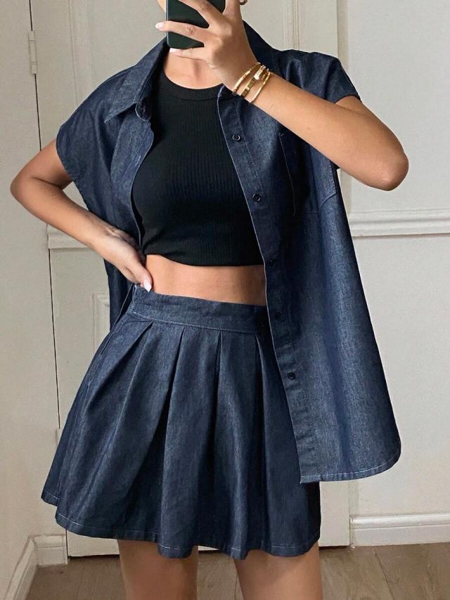 denim collared sleeveless shirt and pleated mini skirt