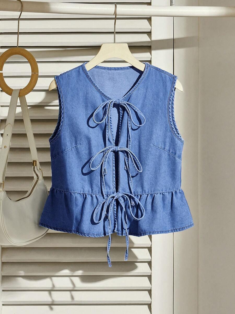 light blue denim vest with tie bow and ruffle hem