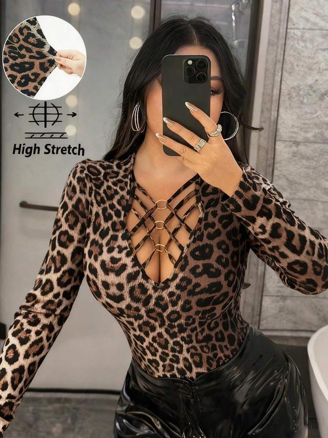 leopard print long sleeve bodysuit with metal ring detail