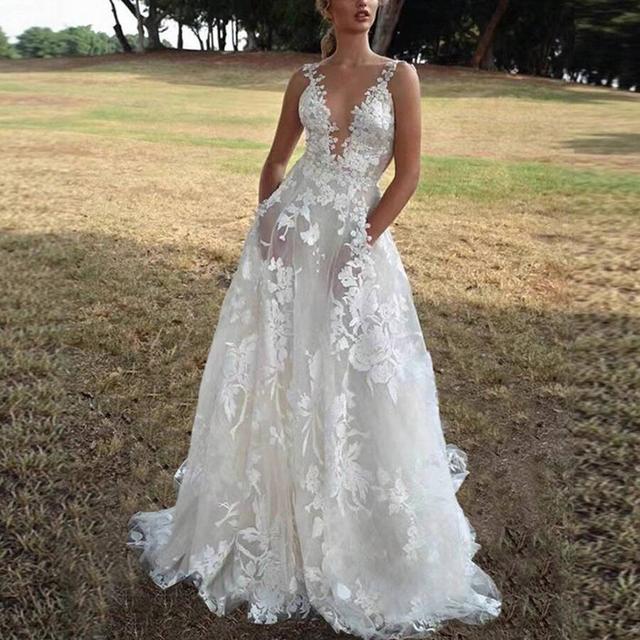 white floral lace applique plunge neck bridal gown