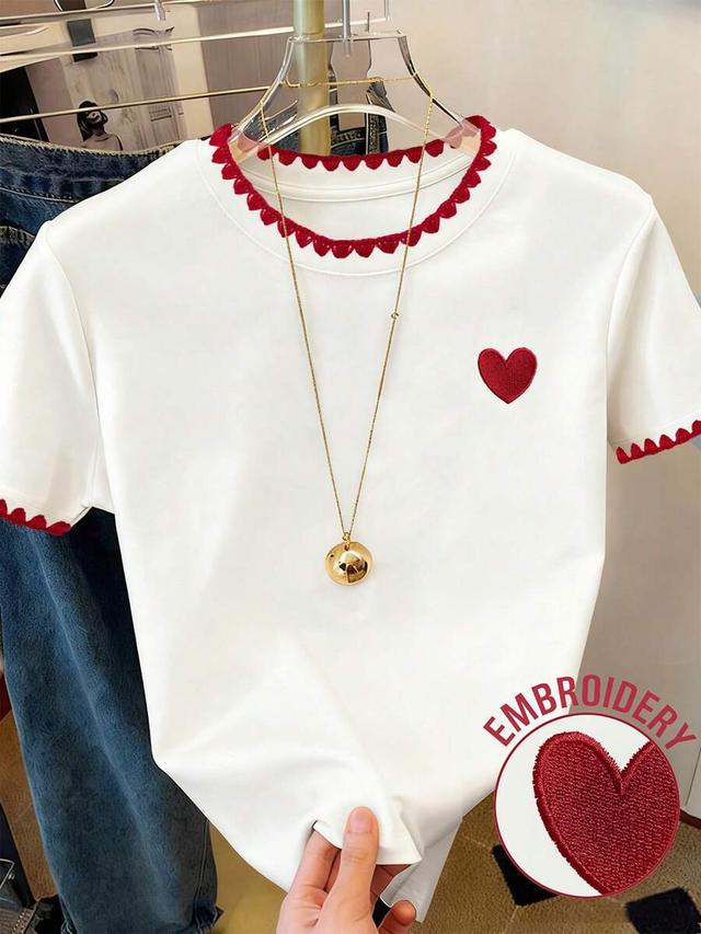 white cotton graphic t-shirt with red heart embroidery