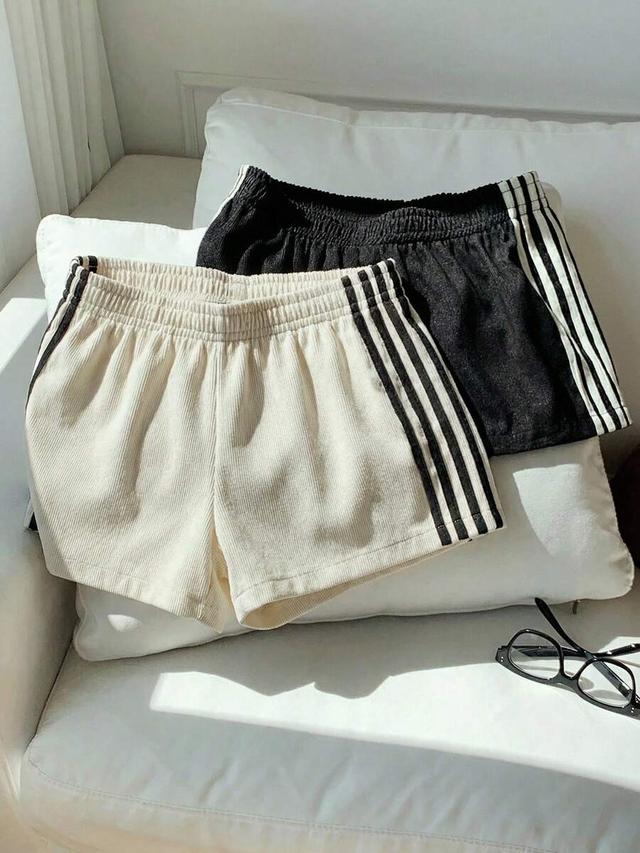 black casual corduroy mini shorts with side stripe detail