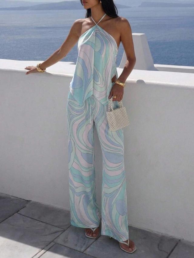 printed satin halter neck top and wide leg trousers