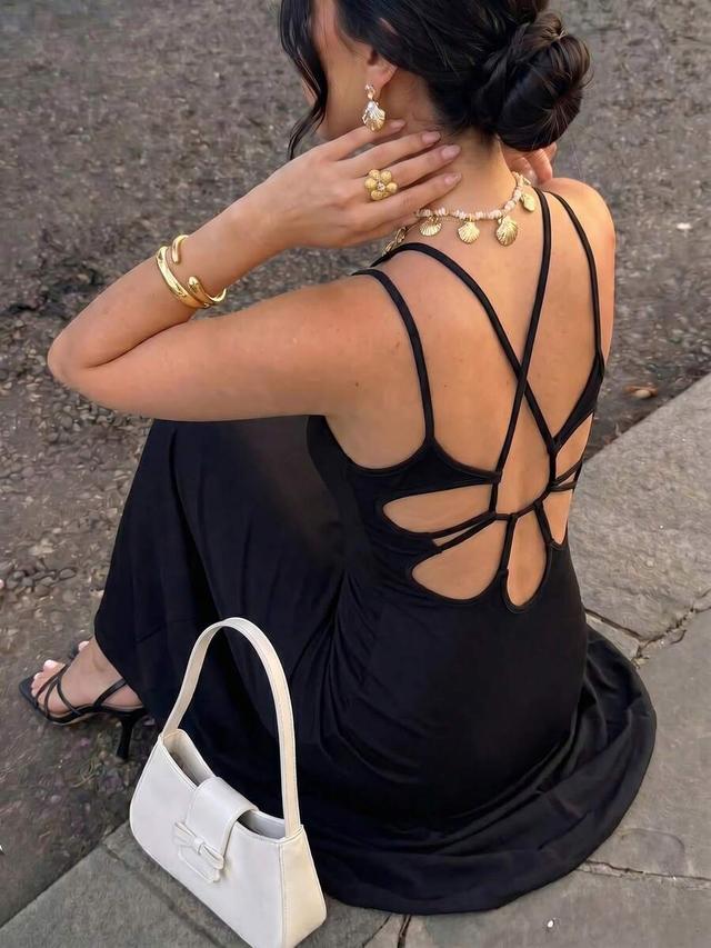 black backless long dress with cutout detail