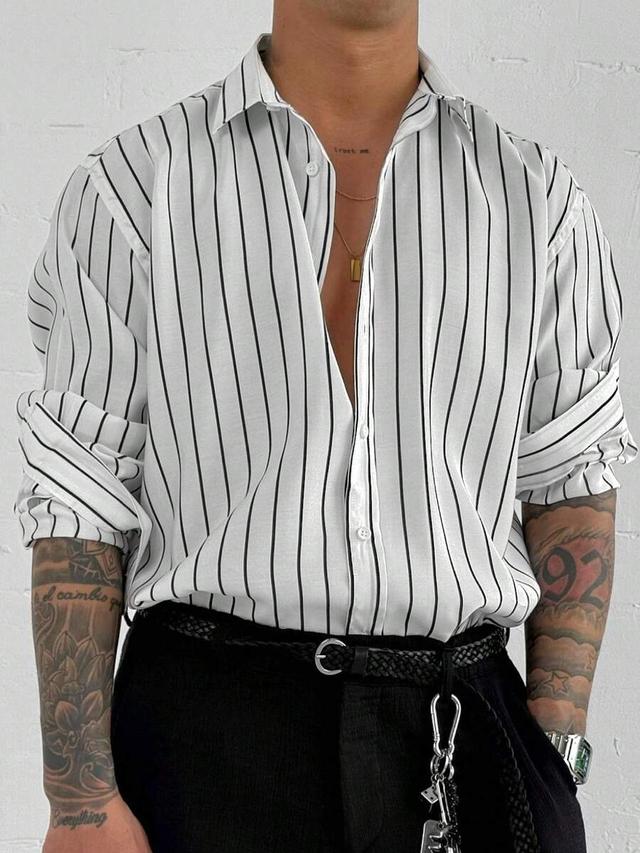 white and black vertical striped long sleeve shirt