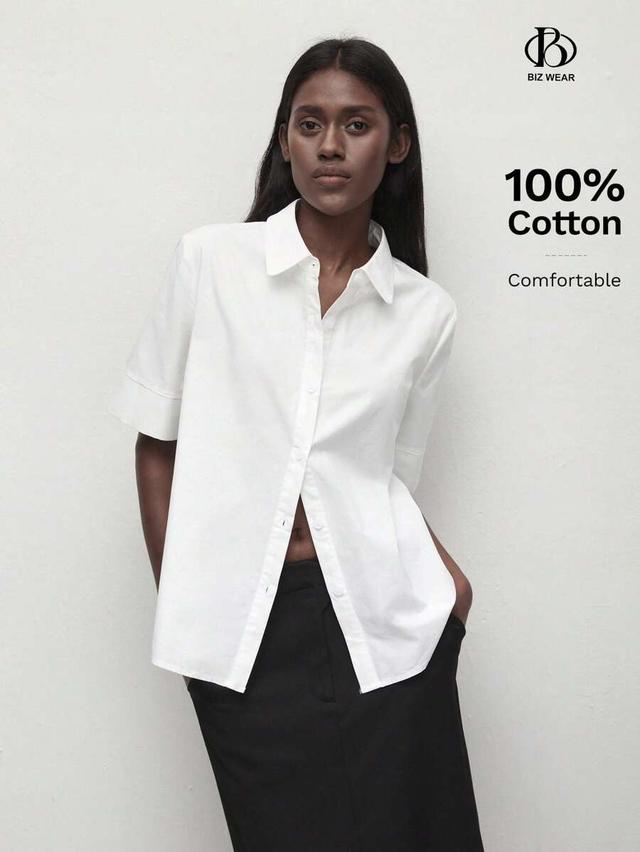 white cotton button-up collared mid-sleeve shirt