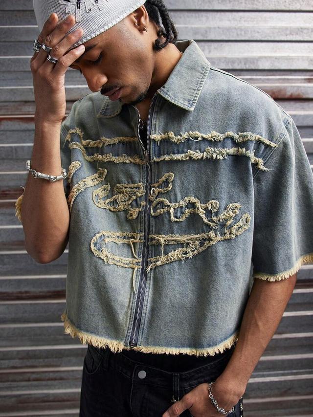 washed denim zip-up jacket with frayed applique embroidery