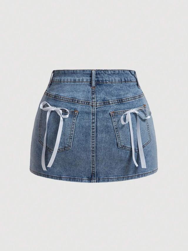 denim mini skirt with white ribbon bow detailing