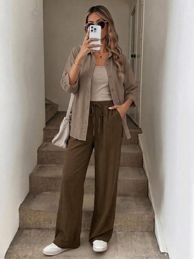 olive green wide-leg drawstring trousers