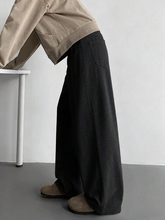 dark grey straight leg commuter casual trousers