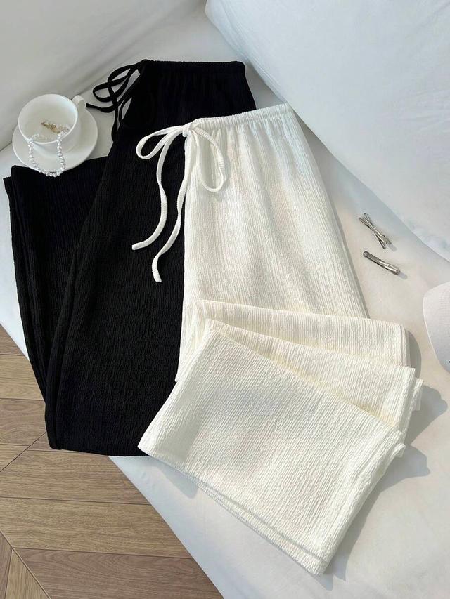 white and white loose straight leg trousers