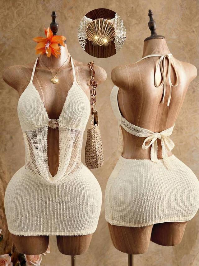 cream textured halter mini dress with shell hardware