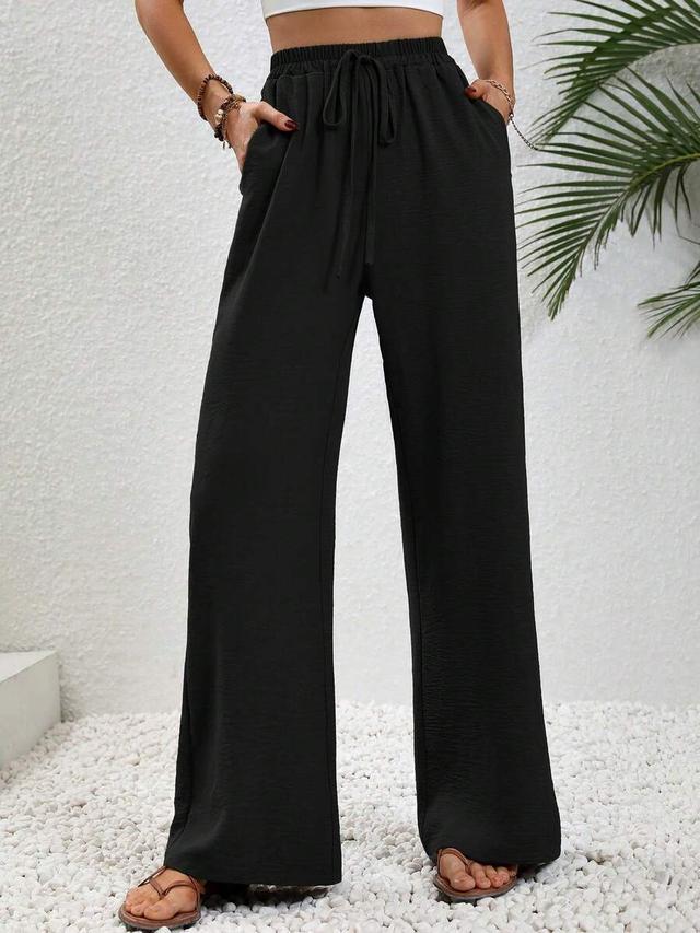 black elastic waist drawstring relaxed straight leg pants