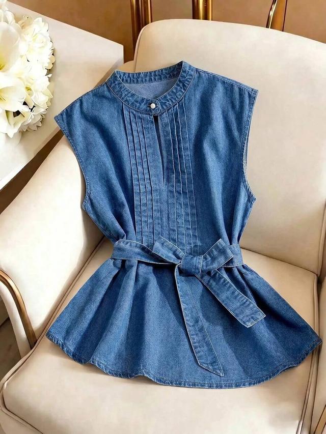 sleeveless denim peplum blouse with pintuck details