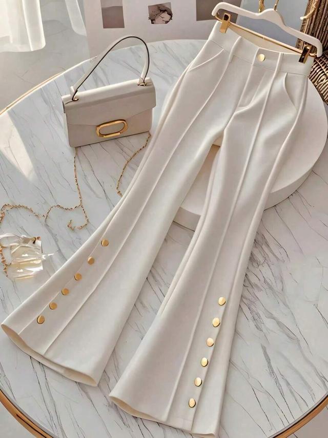 women's solid white high waist flared trousers with gold buttons