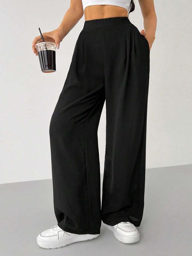 black solid color relaxed fit wide leg trousers
