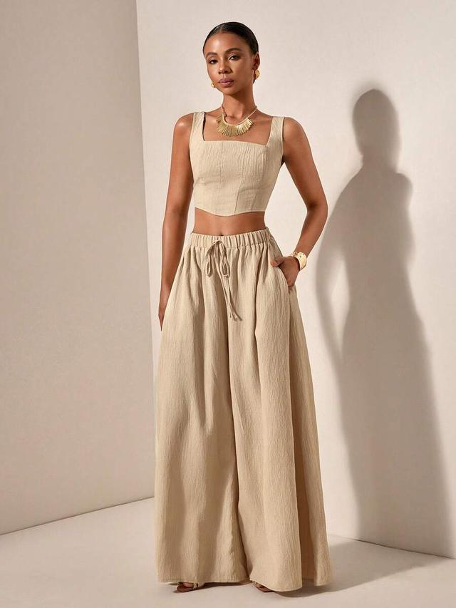 beige textured wide leg trousers with elastic waist