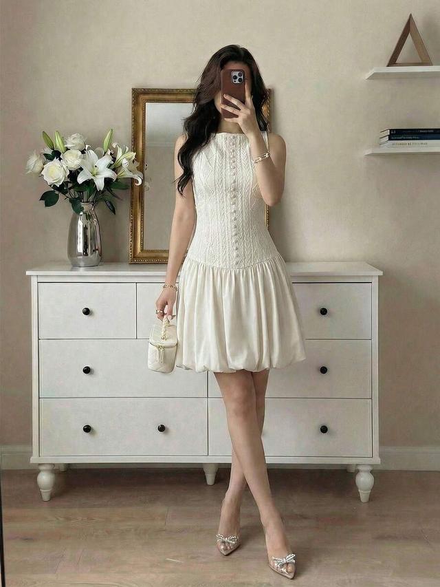 elegant textured sleeveless bubble hem dress