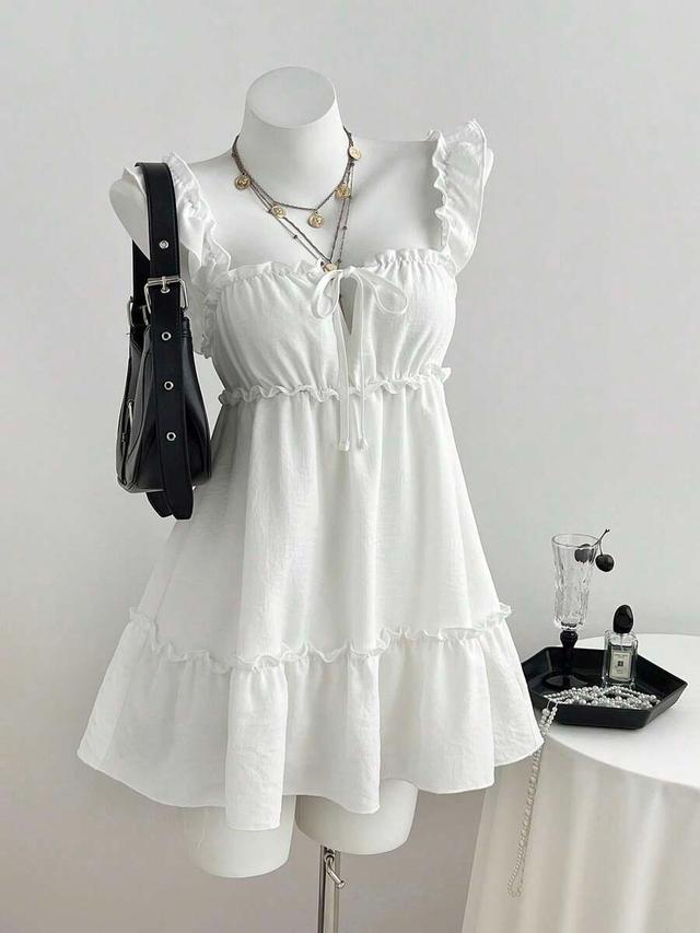 white sleeveless ruffle hem a-line slip dress