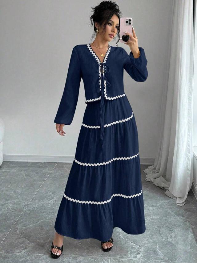 navy blue textured lantern sleeve blouse and skirt set