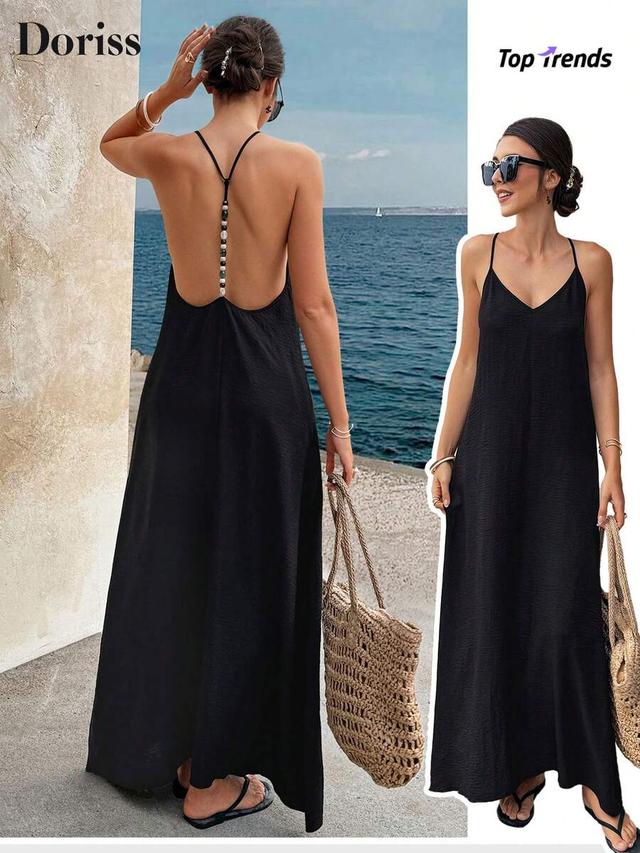 elegant black backless maxi dress with beaded strap
