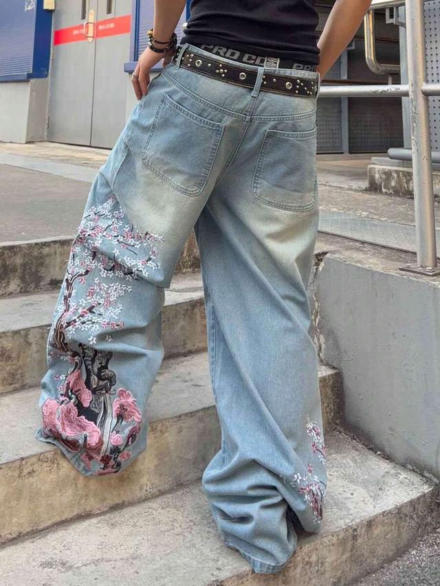 floral embroidered loose fit light wash denim jeans