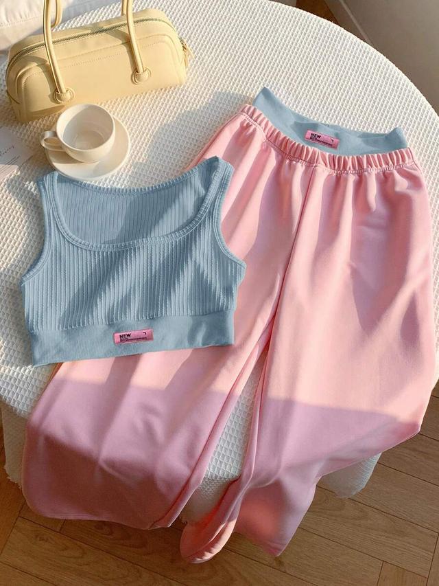 pink ribbed camisole and contrast color block pants set