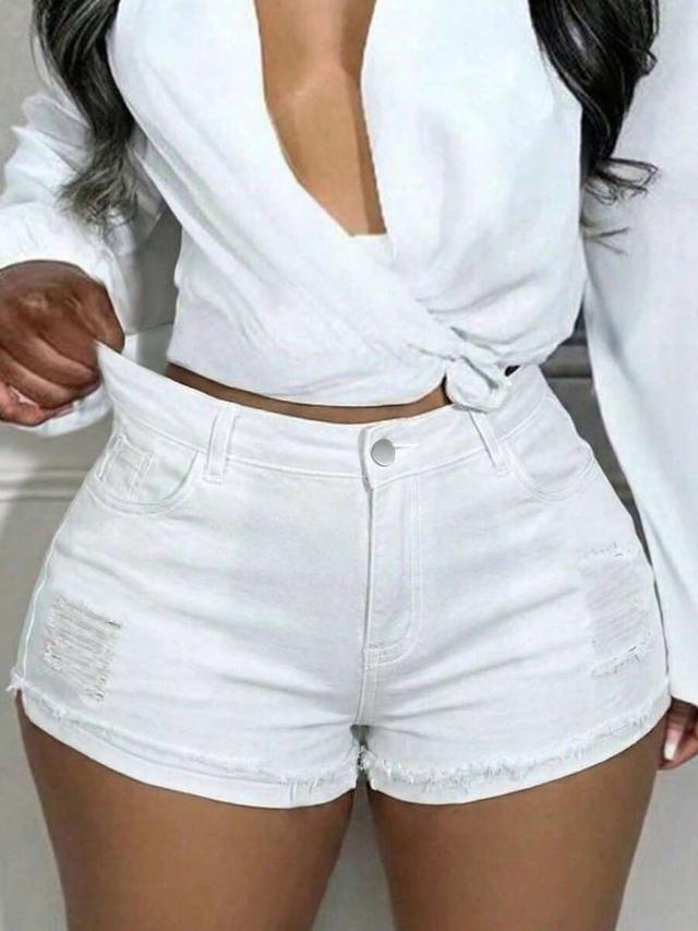 white distressed denim shorts with raw hem