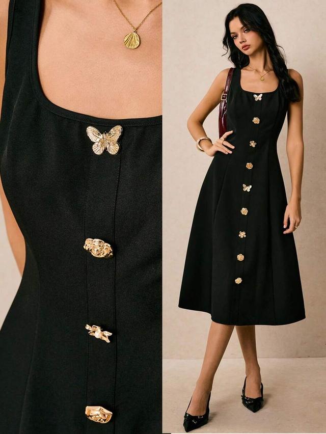 elegant black sleeveless mid-length dress with metal decor