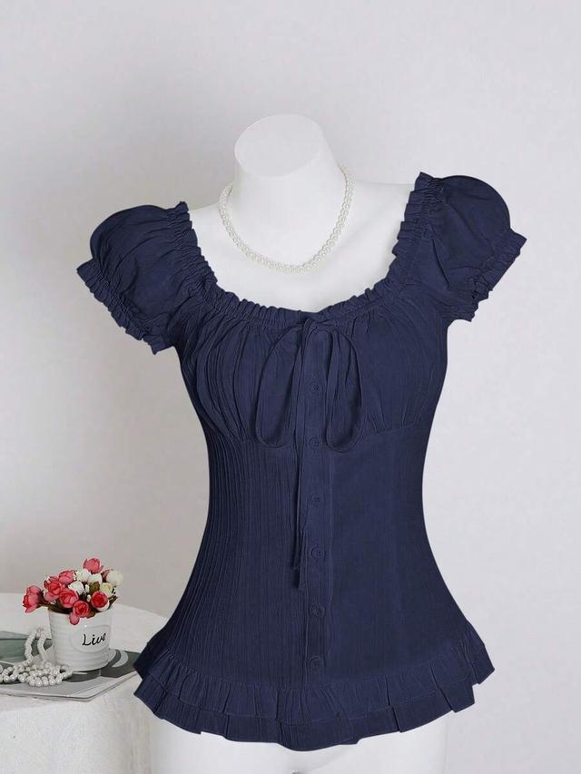 navy blue ruffle hem tie waist short sleeve blouse