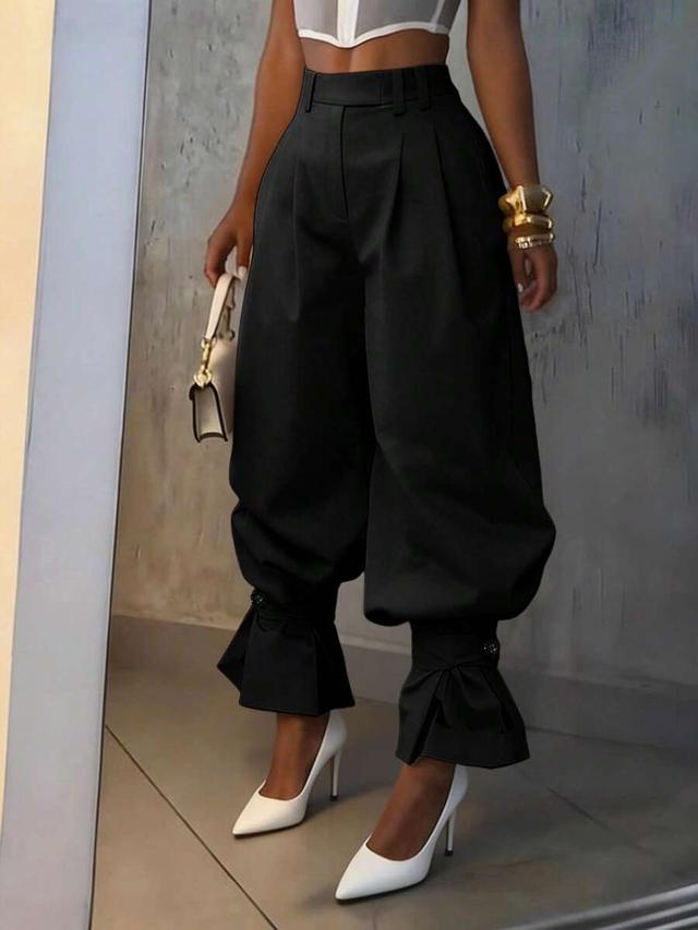 high waist black balloon pants with ruffle hem