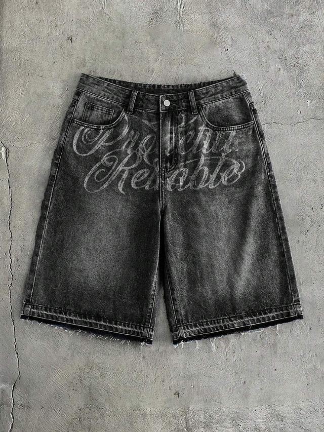 washed black denim shorts with embroidered script