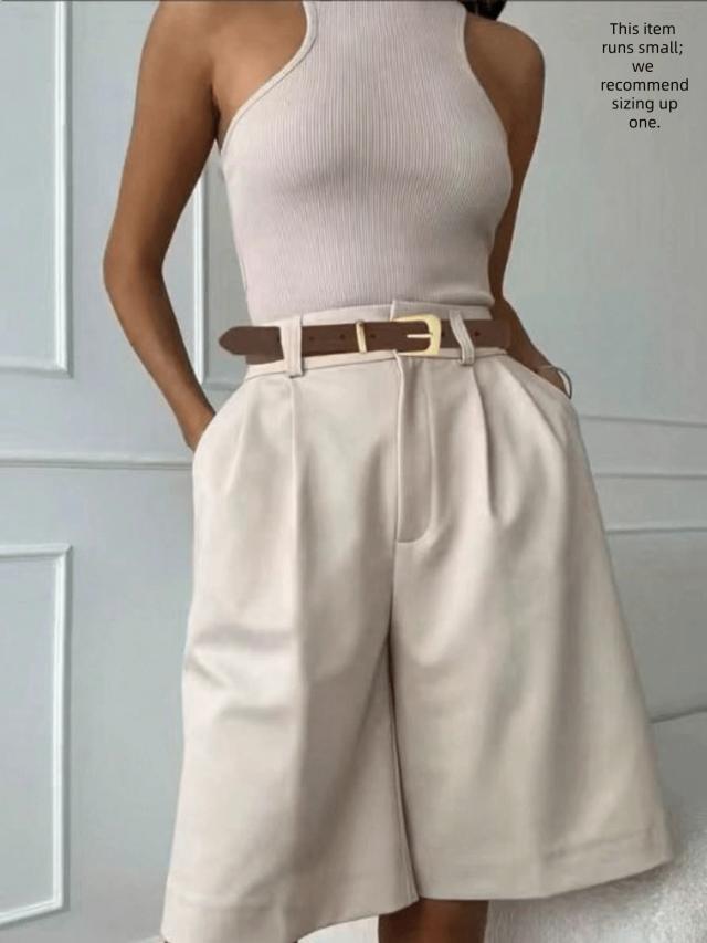 solid beige pleated high-waisted tailored shorts