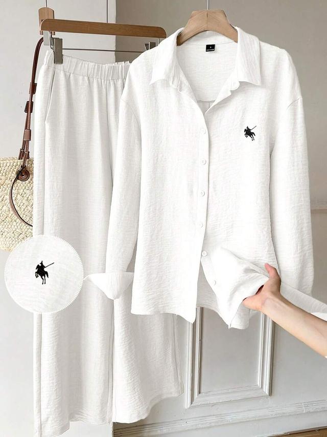 white woven embroidered dropped shoulder long sleeve shirt