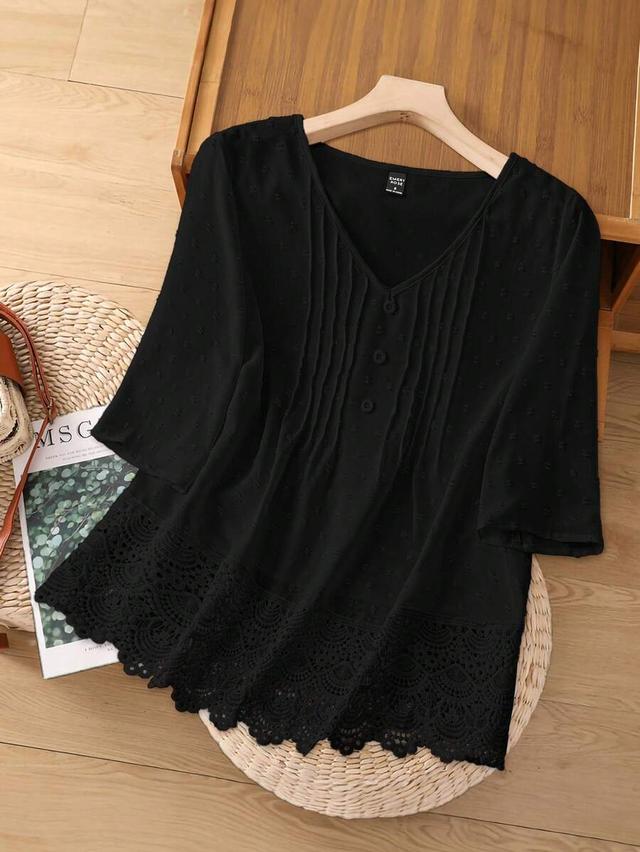 black swiss dot v-neck blouse with lace hem