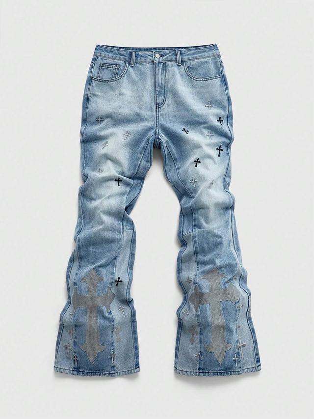 light wash denim jeans with cross embroidery
