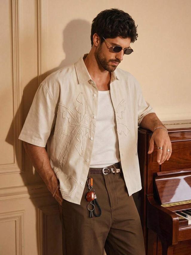 loose fit collared short sleeve shirt with floral embroidery