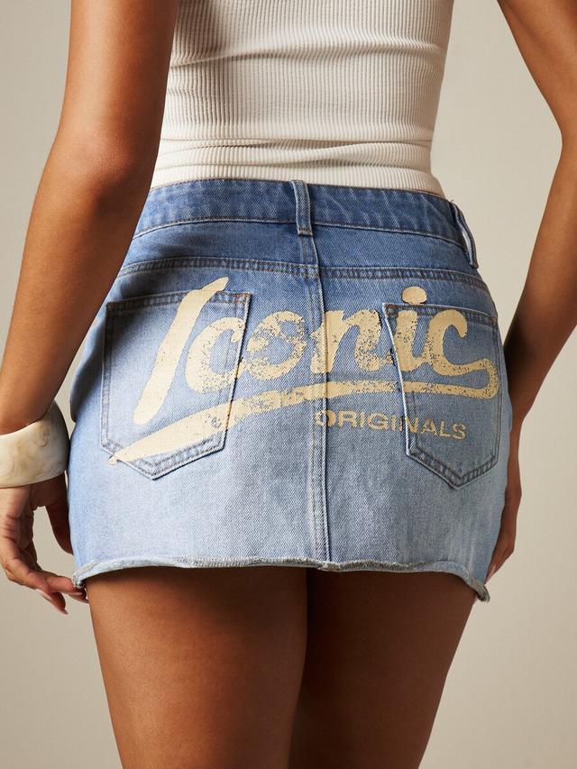 raw edge denim mini skirt with back graphic print