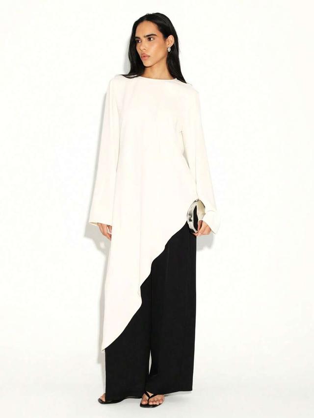 asymmetric flowing tunic blouse with high low hem