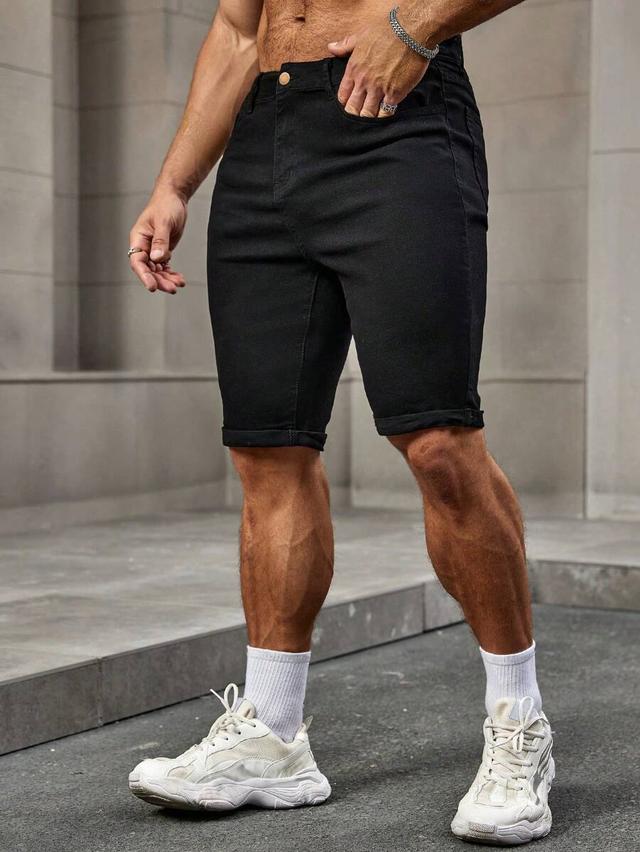 slim fit black denim shorts with rolled cuffs