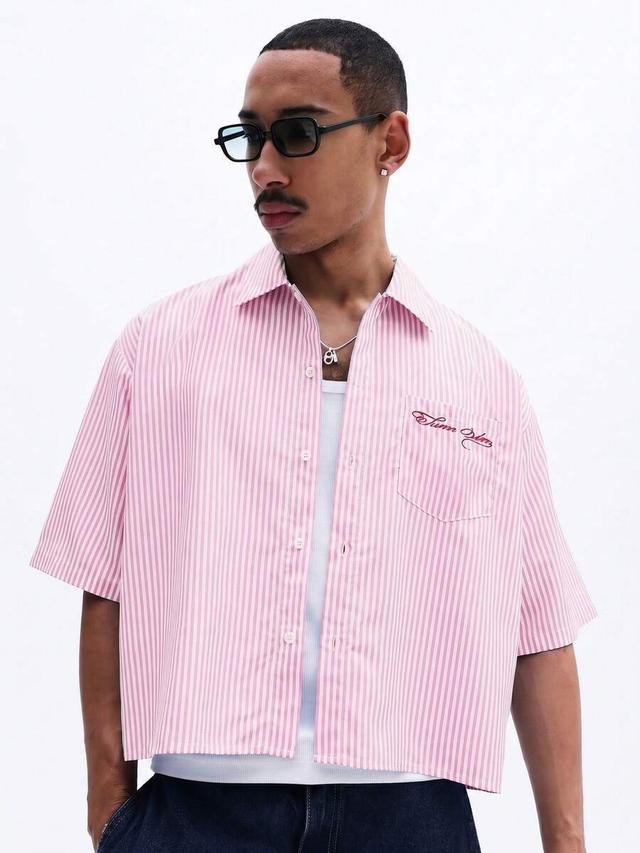 cropped pink and white striped short sleeve button-up shirt