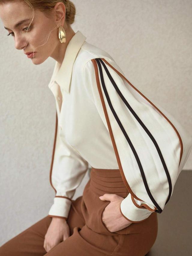cream long sleeve shirt with contrast piping