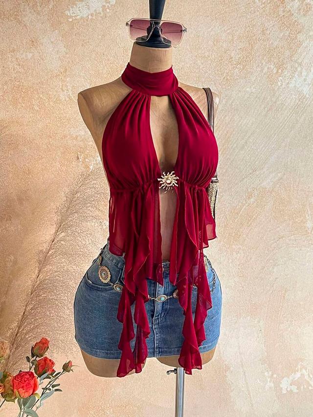 dark red halter neck top with metal sun decor