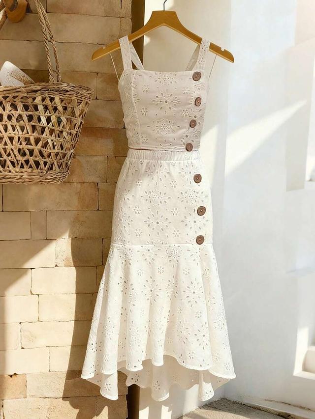 white eyelet crochet camisole and asymmetric button-down skirt set