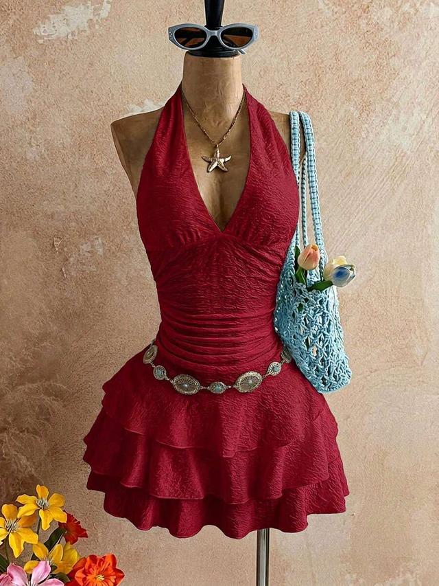 red textured halter mini dress with tiered skirt