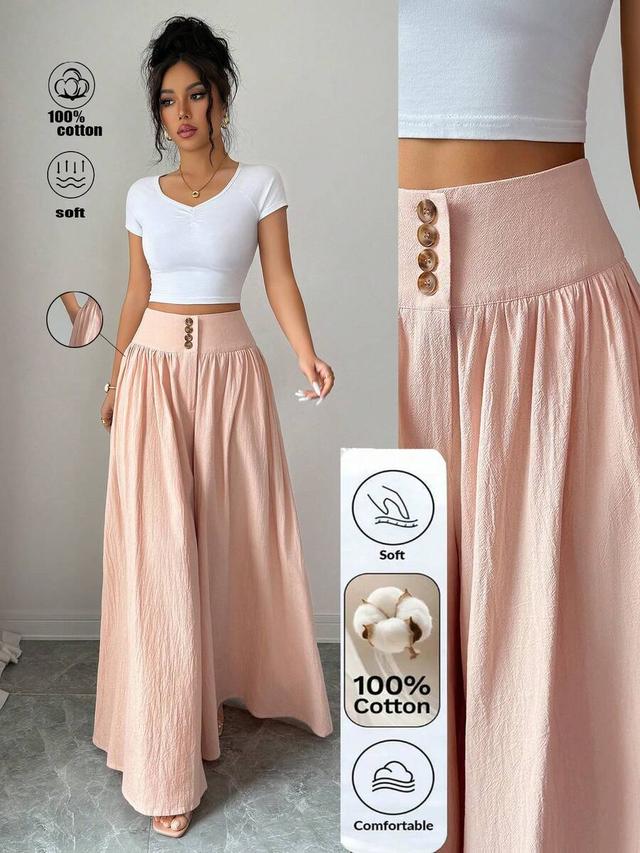 pink cotton wide leg trousers with button detail