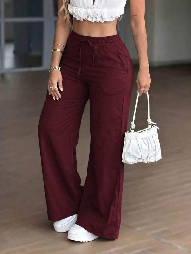 burgundy drawstring linen-style wide leg trousers