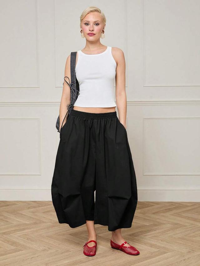 black low rise cropped balloon trousers